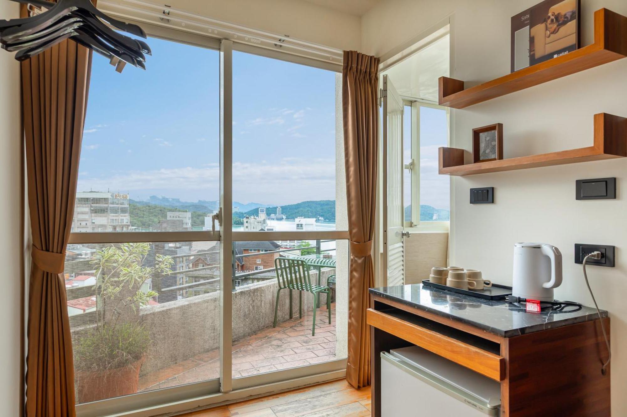 יוצ'י Sun Moon Lake Itathao Vacation Inn With Elevator מראה חיצוני תמונה